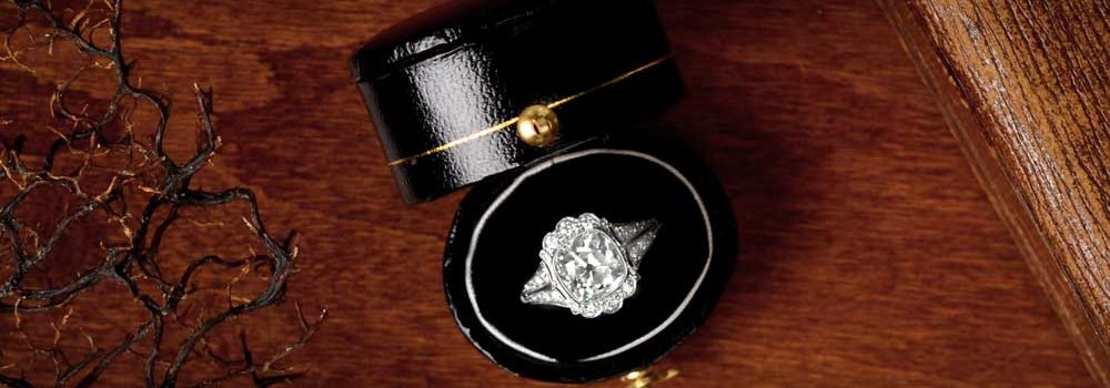 Vintage Engagement Ring in Box on Wood